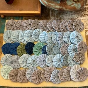 Handmade vintage Fabric Yo-Yo Quilt Pieces, total of 50!